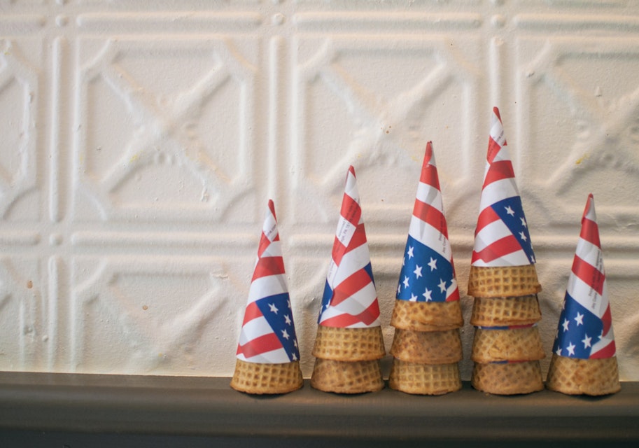 Brooklyn Ice Cream Factory dresses its staff and cone holders in the stars and stripes of the American flag.