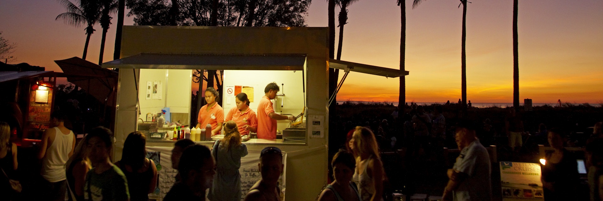 People at food stall at Mindil Beach Sunset Market.
