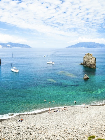 Cala Junco - small bay of Panarea - one of Aeolian Islands near Sicily (Italy). Lipari and Salina islands visible on the horizon.