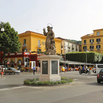 SORRENTO, ITALY - JUNE 24: Piazza Tasso in Sorrento on JUNE 24, 2014. Sant Antonino Abate monument at central place and square in Sorrento, Italy.; Shutterstock ID 238206238; Your name (First / Last): Josh Vogel; GL account no.: 56530; Netsuite department name: Online Design; Full Product or Project name including edition: Digital Content/Sights