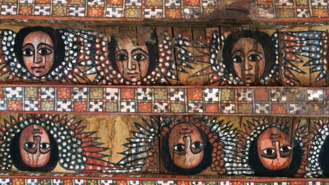 Detail of winged heads of cherubs on ceiling of church of Debre Berhan Selassie.