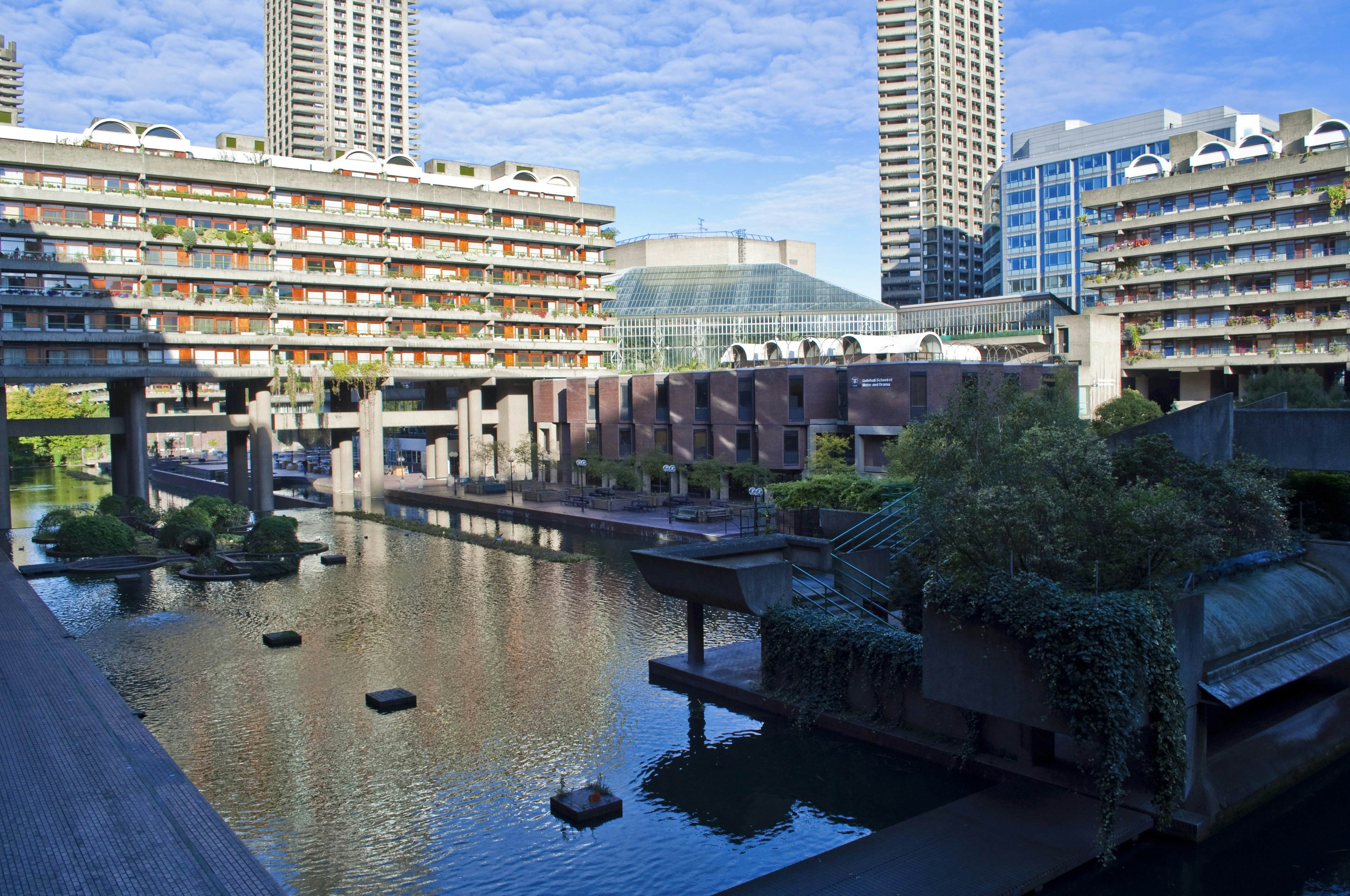 Water feature, residential towers and the Barbican Centre.