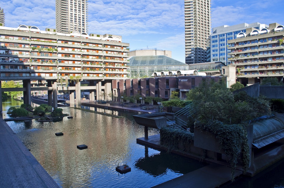 Water feature, residential towers and the Barbican Centre.