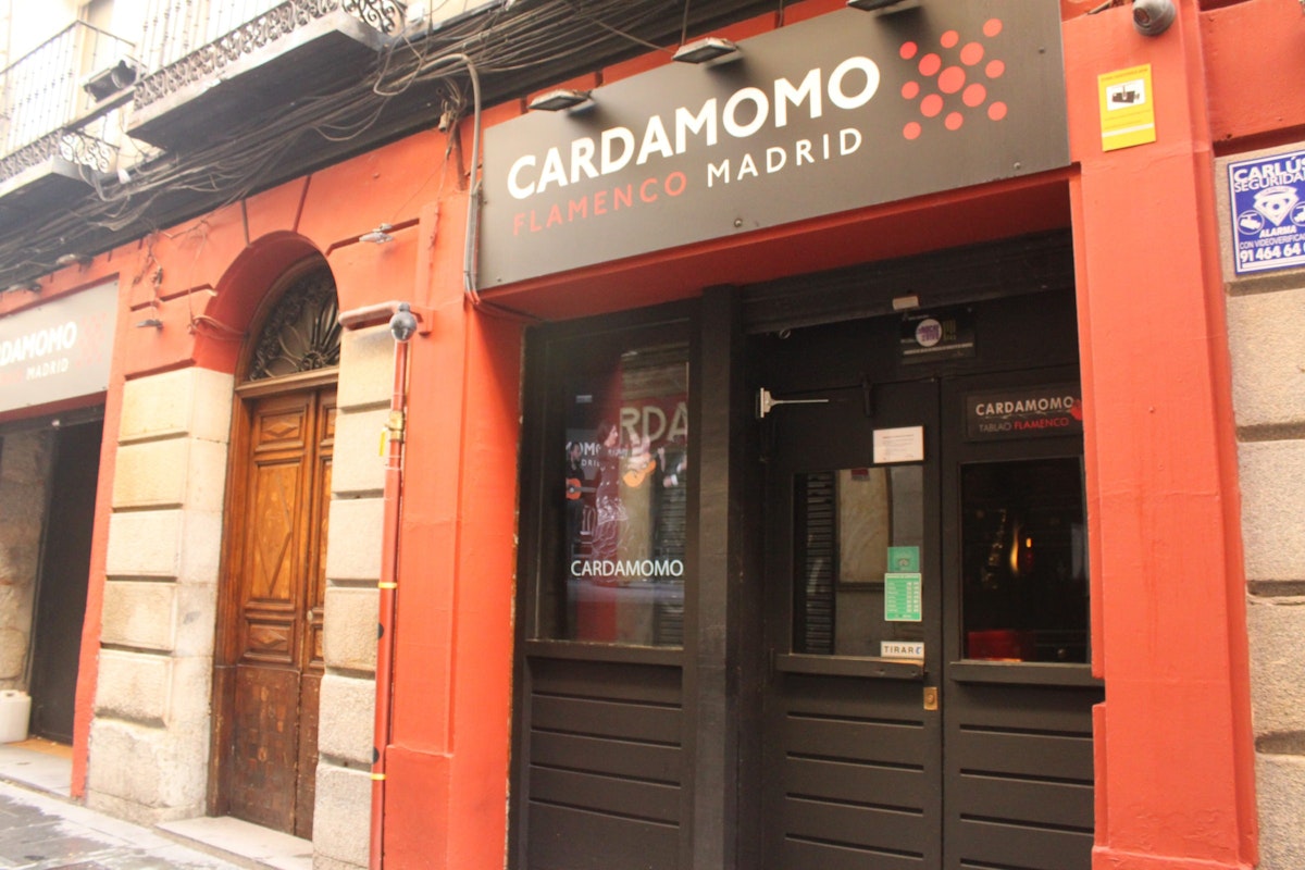 A TV in the entrance of Cardamomo gives passers-by a taste of what they can expert at a flamenco show.