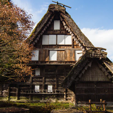 Traditional gassho sukuri farmhouses, similar to those in Shirakawago, at Hida Folk Village open air museum in Takayama, Japan. ; Shutterstock ID 371809138; Your name (First / Last): Laura Crawford; GL account no.: 65050; Netsuite department name: Online Editorial; Full Product or Project name including edition: BiA: Takayama, south of Tokyo POI images for online