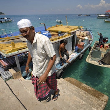 Boatman at jetty.