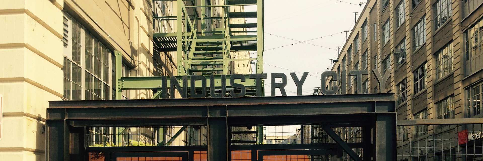 Gate with Industry City logo.