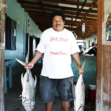 Portrait of fisherman at Dangriga market.