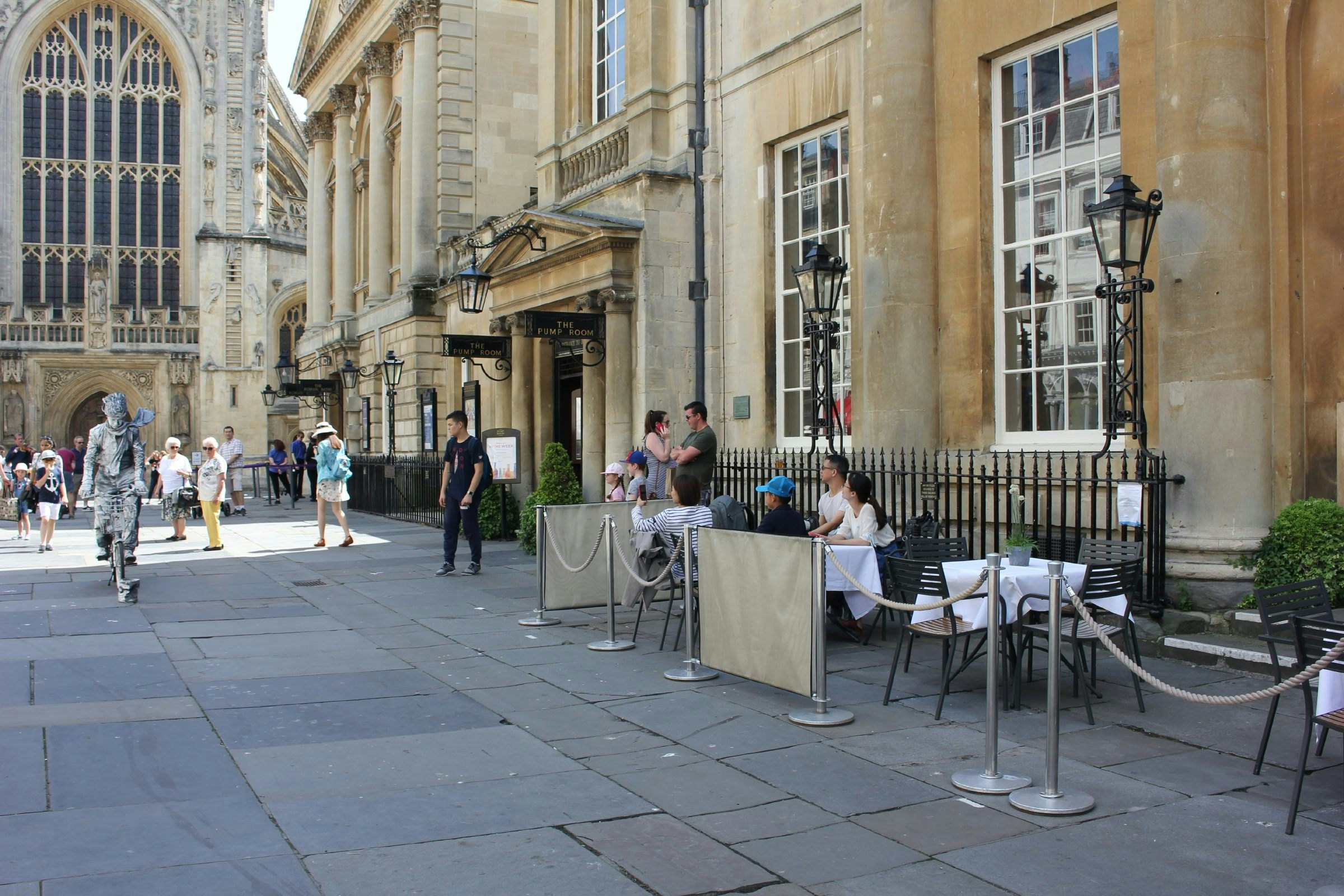 Dining outside the Pump Rooms while watching street performers