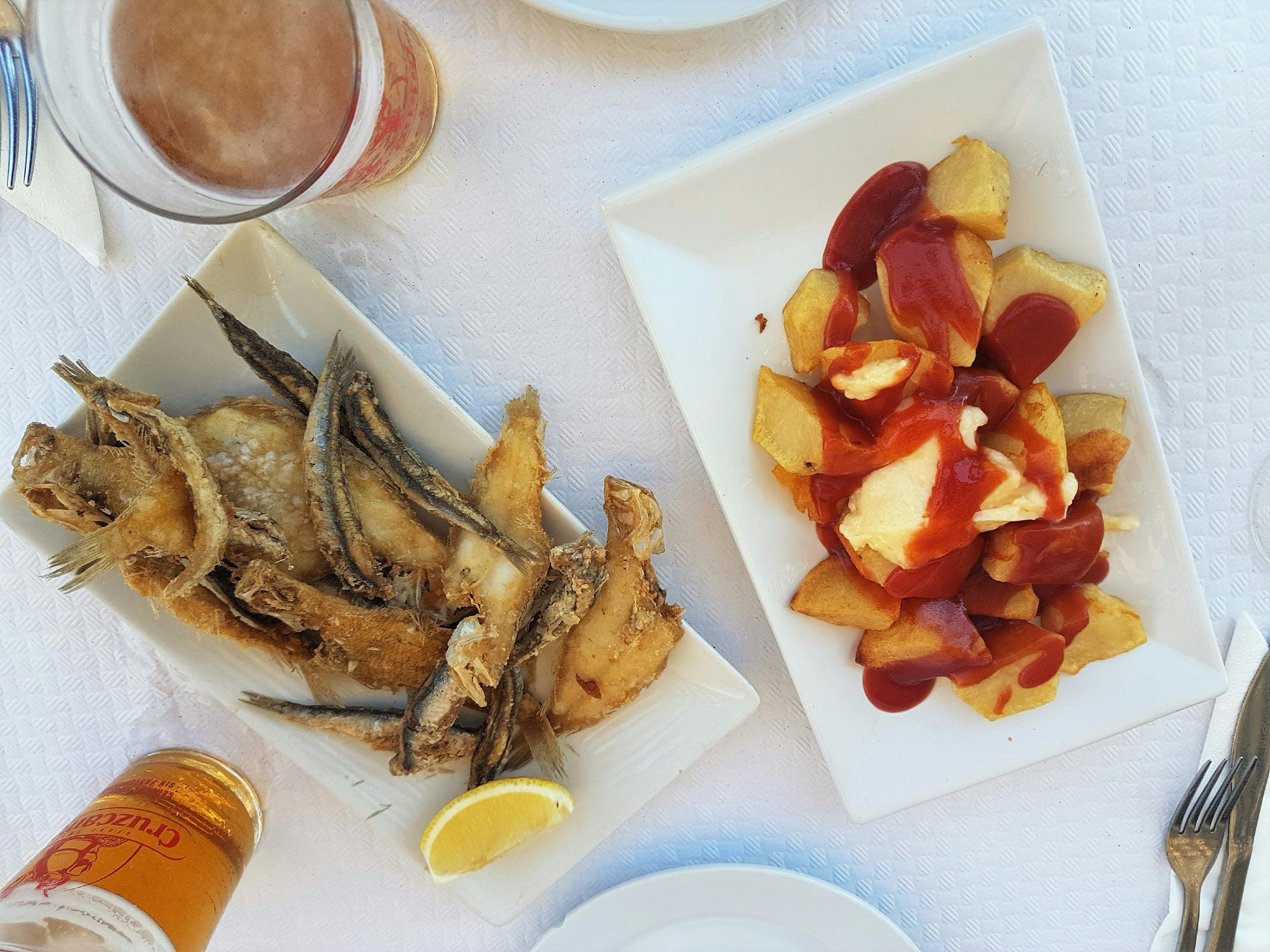 Seafood tapas and beers at a Spanish restaurant