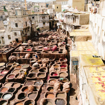 Top of every tourists list when visiting Fez seems to be a visit to the Chaouwara (Chouara) Tanneries. With the help of a guide you are taken into one of the many leather shops that surround the open air tanning pits and with some explanation of the dying process, you will also be encouraged to buy some leather products. It is a beautiful sight and worth a visit.