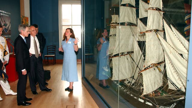 040625-N-2568S-006 Boston, Mass. (June 25, 2004) --  Sarah Watkins, Curator for the Constitution Museum describes Constitution's rigging to Secretary of the Navy Gordon R. England and British Ambassador Sir David Manning, during a tour of the museum.  The Secretary and Ambassador also toured Constitution and Bunker Hill, and were honored guests at a recption aboard the British ship HMS Cornwall.  The visit focused on the close tie between the U.S. and royal navies; a partnership that is a key element in the war on terrorism  U.S. Navy photo by Chief Journalist Craig P. Strawser. (RELEASED) . .