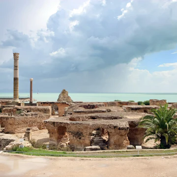 .Antonine Baths, Carthage. Tunisia. Ancient Carthage. General view of Antonine Baths - fragment of ruined caldarium ,the hottest room, and steamroom; Shutterstock ID 122636446; Your name (First / Last): Lauren Keith; GL account no.: 65050; Netsuite department name: Online Editorial; Full Product or Project name including edition: Tunisia Destination Page image update
