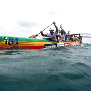 A team paddles in their Vaa, a Polynesian outrigger canoe, on the second day of the Hawaiki Nui Vaa race on November 6, 2014, following their start from the main island of Huahine. Each year, the race brings together more than 130 teams in a three stage race over three days:- the Huahine Raiatea, (44.5 km), Raiatea-Tahaa (26 km) and Tahaa, Bora Bora (58.2 km) without changing crew. The kickoff of this new edition has been given this morning Fare . AFP PHOTO/GREGORY BOISSY        (Photo credit should read GREGORY BOISSY/AFP/Getty Images)
