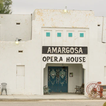DEATH VALLEY JUNCTION, CA/USA - OCTOBER 25 2015: the facade of the Amargosa Opera House. The Amargosa Opera House and Hotel is a historic building and cultural center located in Death Valley.; Shutterstock ID 332234195; Your name (First / Last): Emma Sparks; GL account no.: 65050; Netsuite department name: Online Editorial; Full Product or Project name including edition: Best_in_the_US_POIs