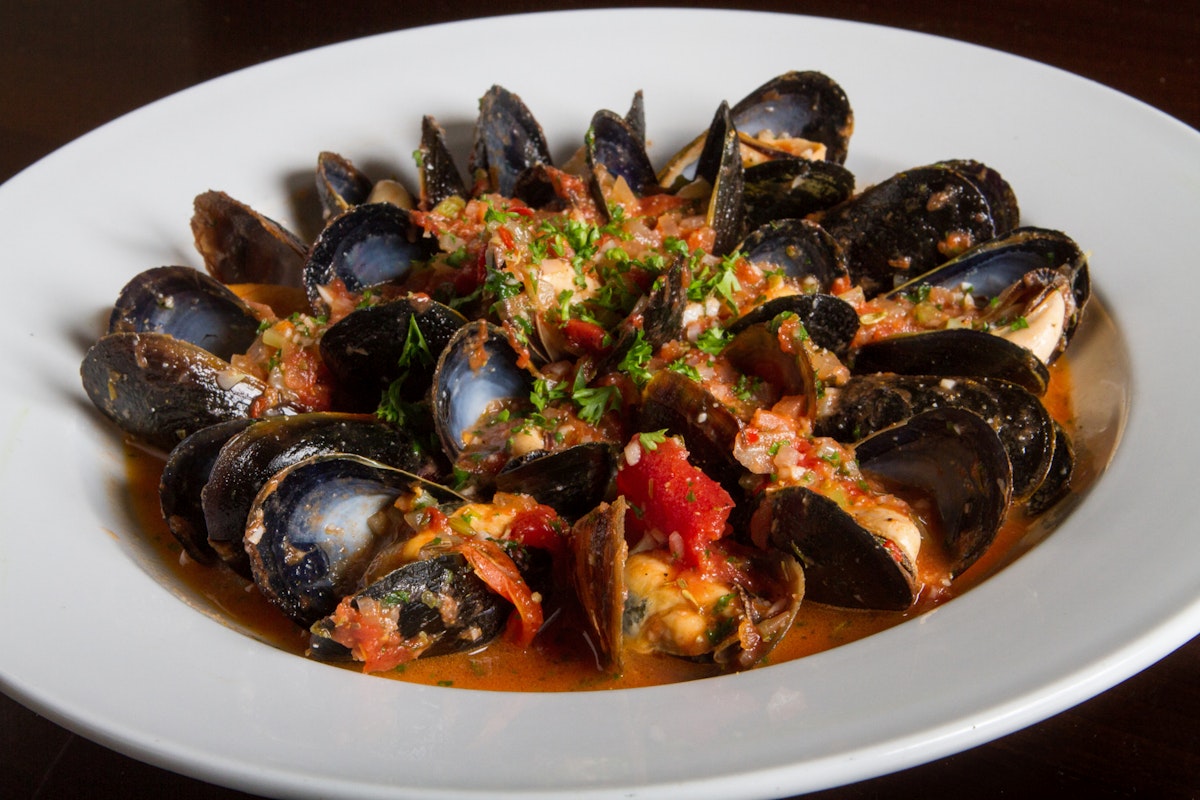 Bowl of Steamed Mussels in Red Sauce. (Photo by: UIG Platinum/UIG via Getty Images)