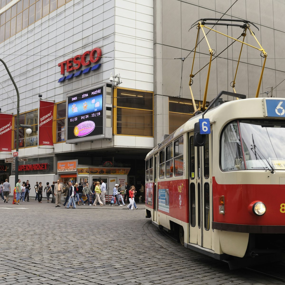 Tram passing Tesco department store on Narodni trida (National Avenue), Nove Mesto.