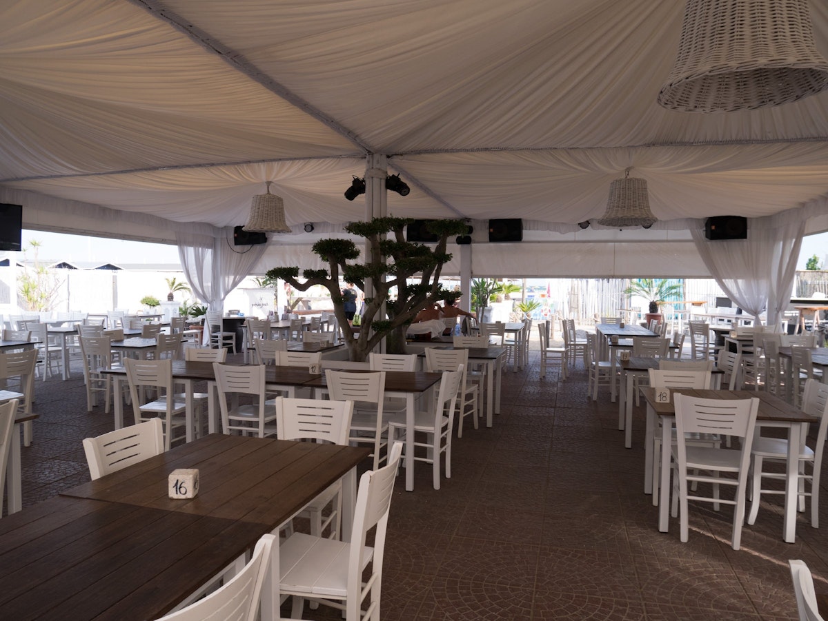 Tables stand under the awning and there is room for alfresco dancing at Pachuka
