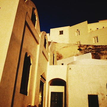 Whitewashed houses of Syros in the evening light.