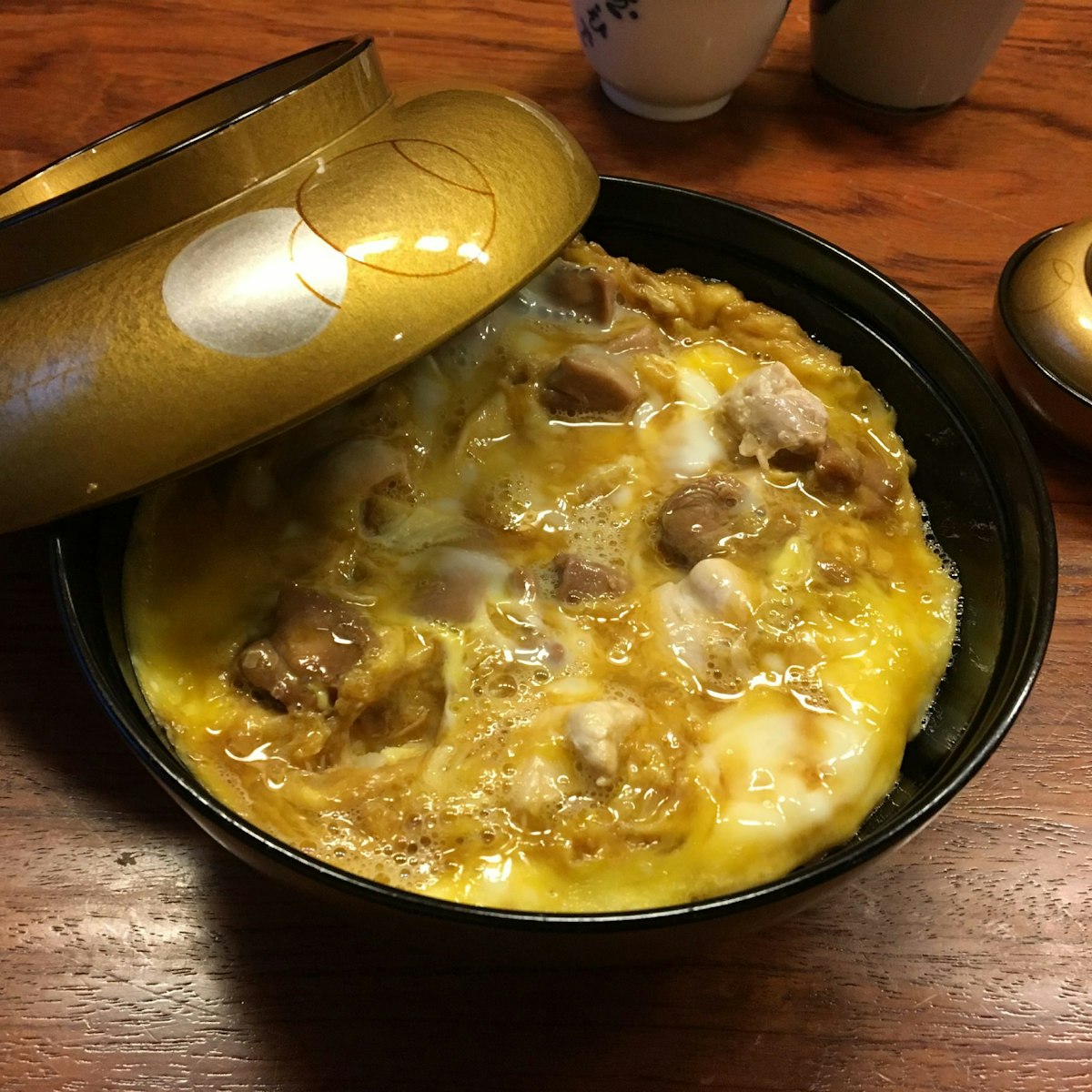 Tamahide's famous oyakodon (chicken and omelette on rice), served in a laquer bowl, Marunouchi & Nihombashi.