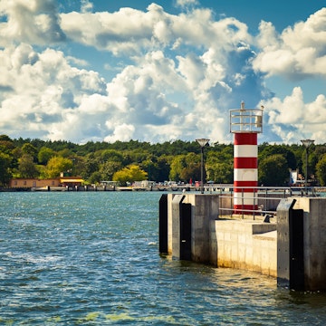 small striped lighthouse in Klaipeda
