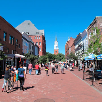 People enjoy Church street in Burlington, Vermont. (Photo by: Education Images/UIG via Getty Images)