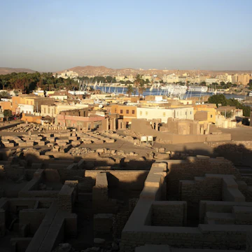 Ruins of Abu on Elephantine Island with Nile River in the background.