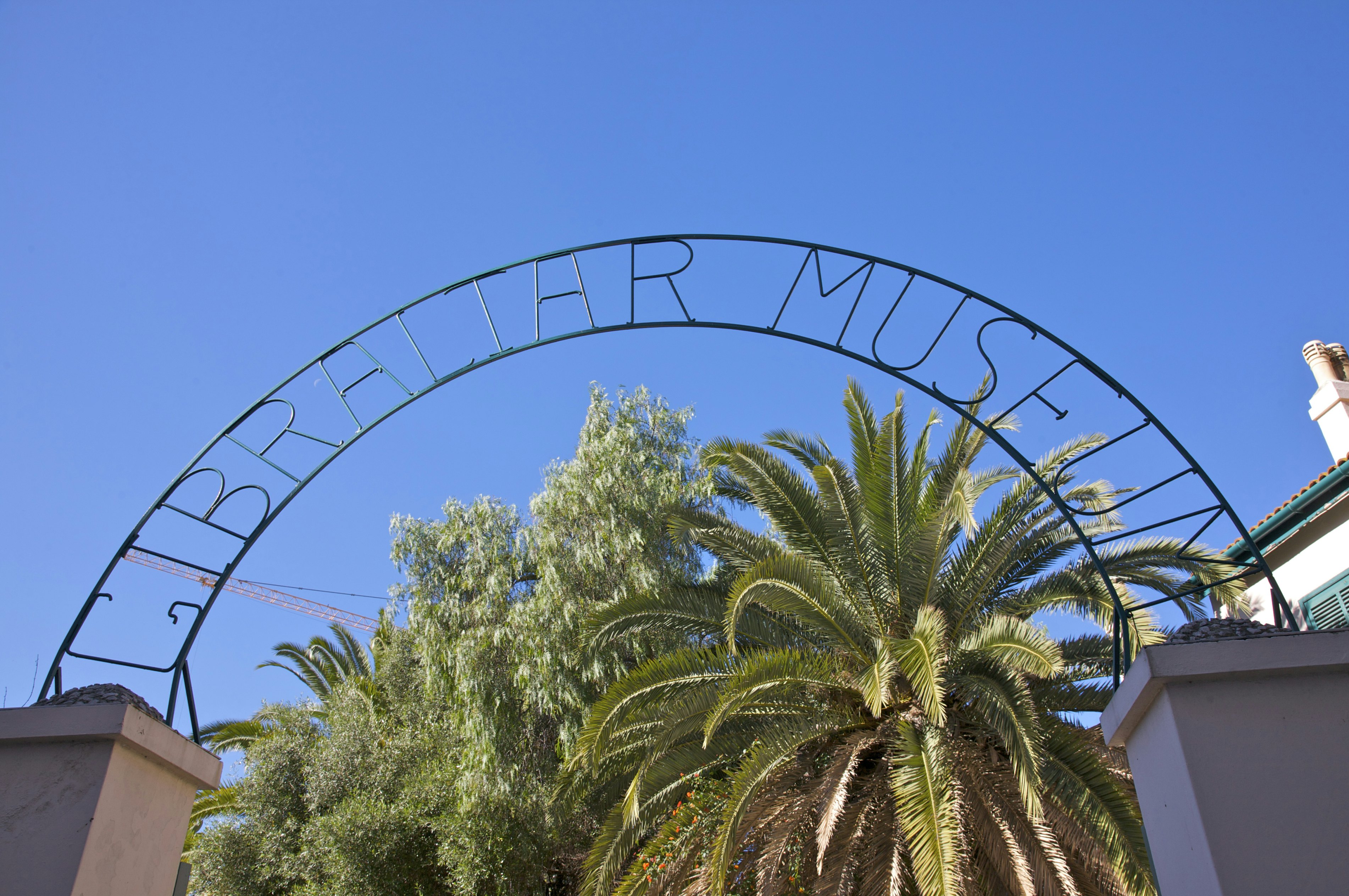 Arching sign for Gibraltar Museum, Gibraltar, U.K.