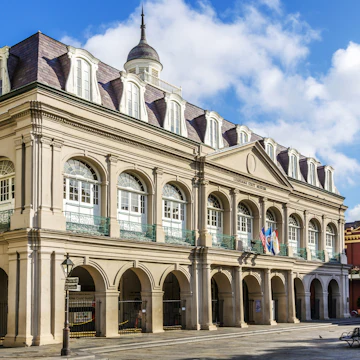 NEW ORLEANS, USA - JULY 17, 2013: houses in historic building in the French Quarter in New Orleans, USA. Tourism provides a large source of revenue after the 2005 devastation of Hurricane Katrina.; Shutterstock ID 206700100; Your name (First / Last): Lauren Gillmore; GL account no.: 56530; Netsuite department name: Online-Design; Full Product or Project name including edition: 65050/ Online Design /LaurenGillmore/POI