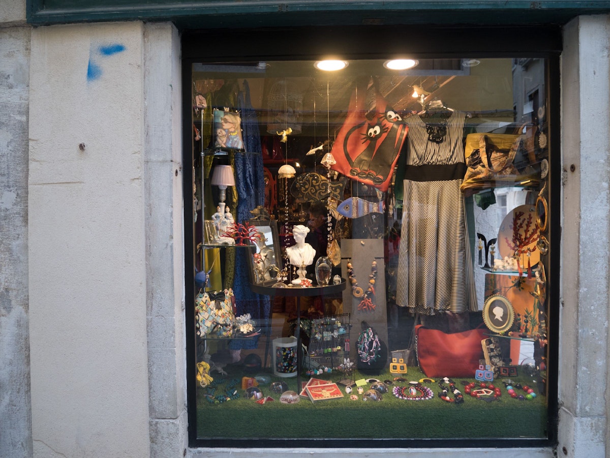 The La Maison de La Sireneuse shop's side window is full of tantalising objects