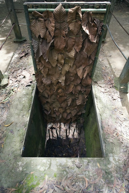 View of one of the leaf-covered traps used by Vietnamese soldiers during the Vietnam war, near HoChiMinh City, Vietnam