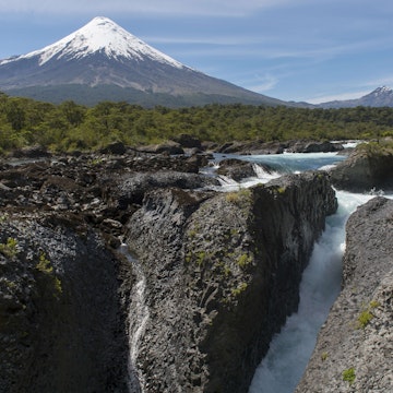 CHILE - 2016/11/30: The Petrohue Rapids and Osorno Volcano in Vicente Perez Rosales National Park near Puerto Varas and Puerto Montt in the Lake District in southern Chile. (Photo by Wolfgang Kaehler/LightRocket via Getty Images)