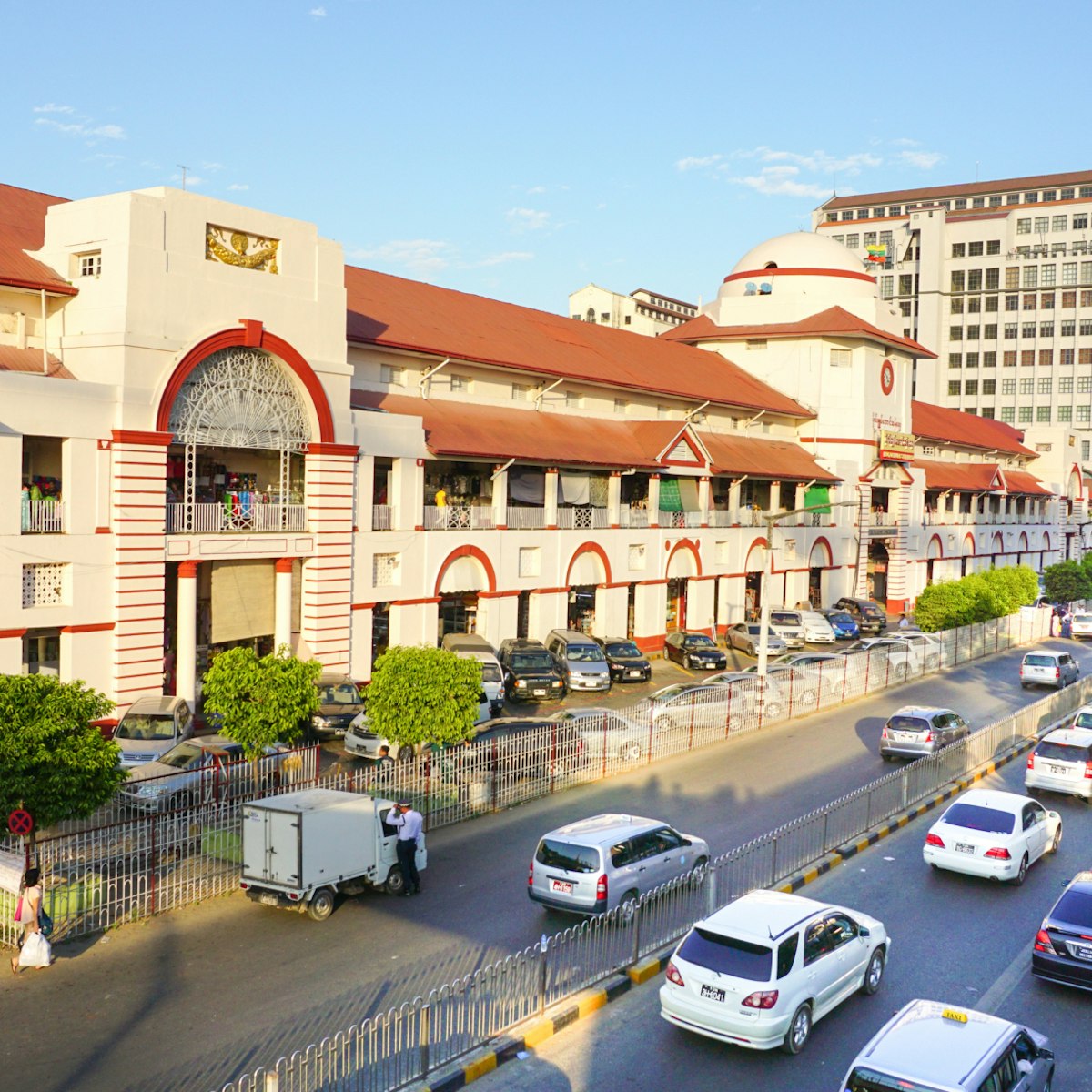 Yangon, Myanmar - Jan 14, 2015. The Sule Boulevard with famous Bogyoke Market built in 1926 and formely know as Scott Market. Sule Boulevard are the busiest street in Yangon.; Shutterstock ID 285905090; Your name (First / Last): Laura Crawford; GL account no.: 65050; Netsuite department name: Online Editorial; Full Product or Project name including edition: Yangon images for city app POIs