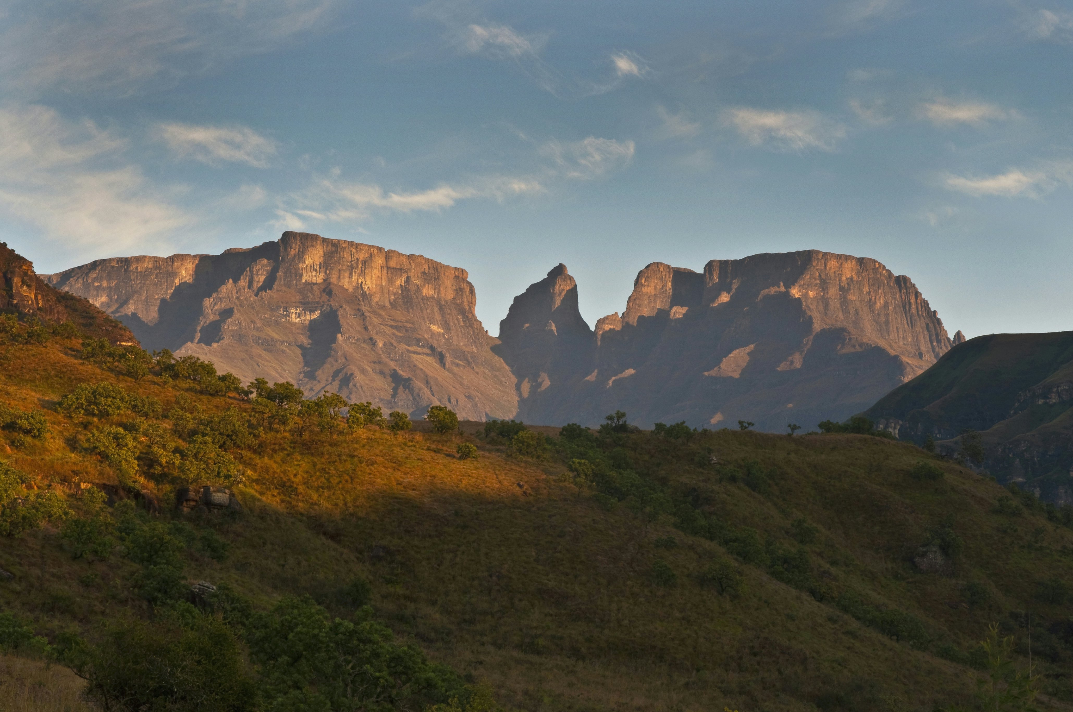 Sunrise on mountain peaks. Ukhahlamba Drakensberg Park, Kwazulu Natal Province, South Africa