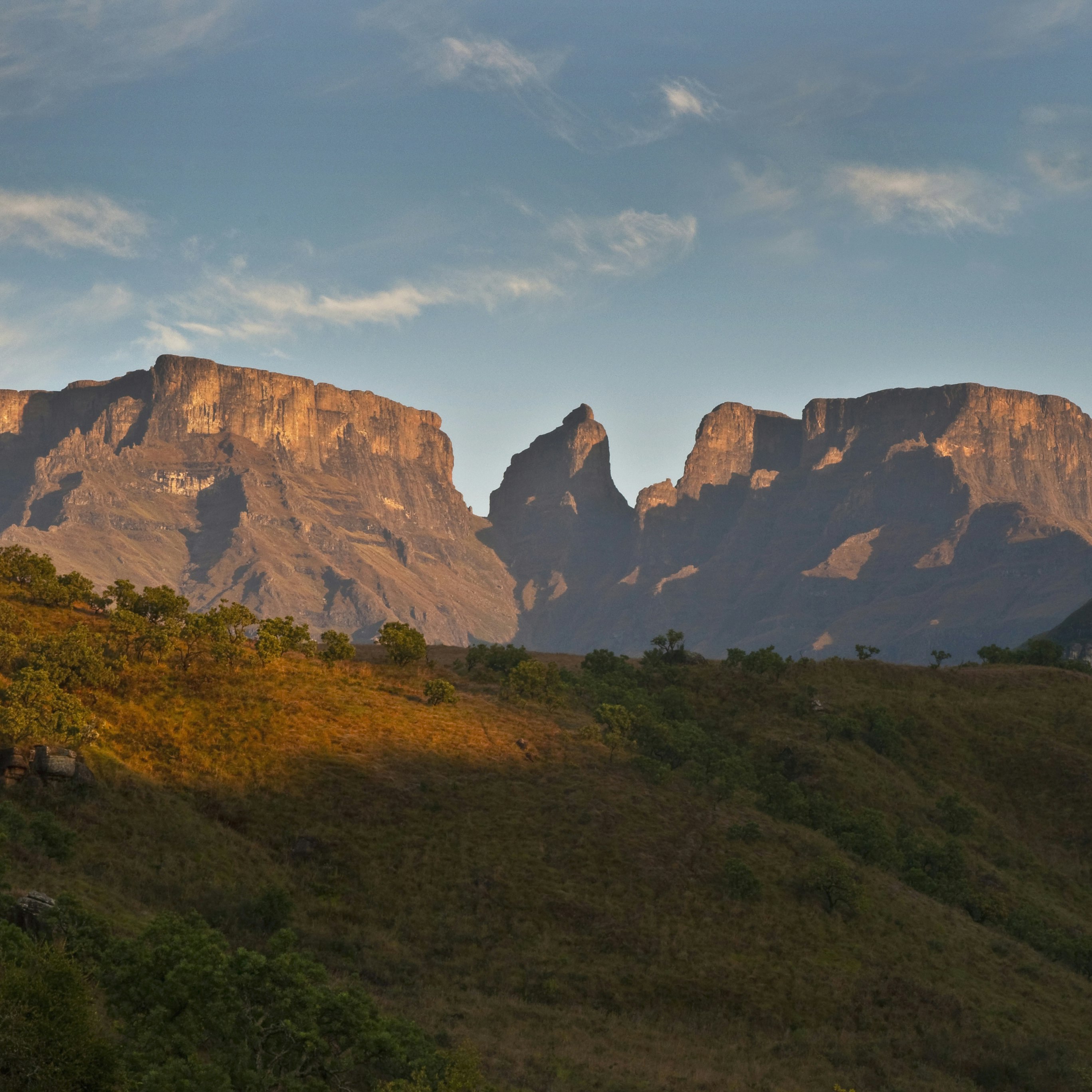 Sunrise on mountain peaks. Ukhahlamba Drakensberg Park, Kwazulu Natal Province, South Africa