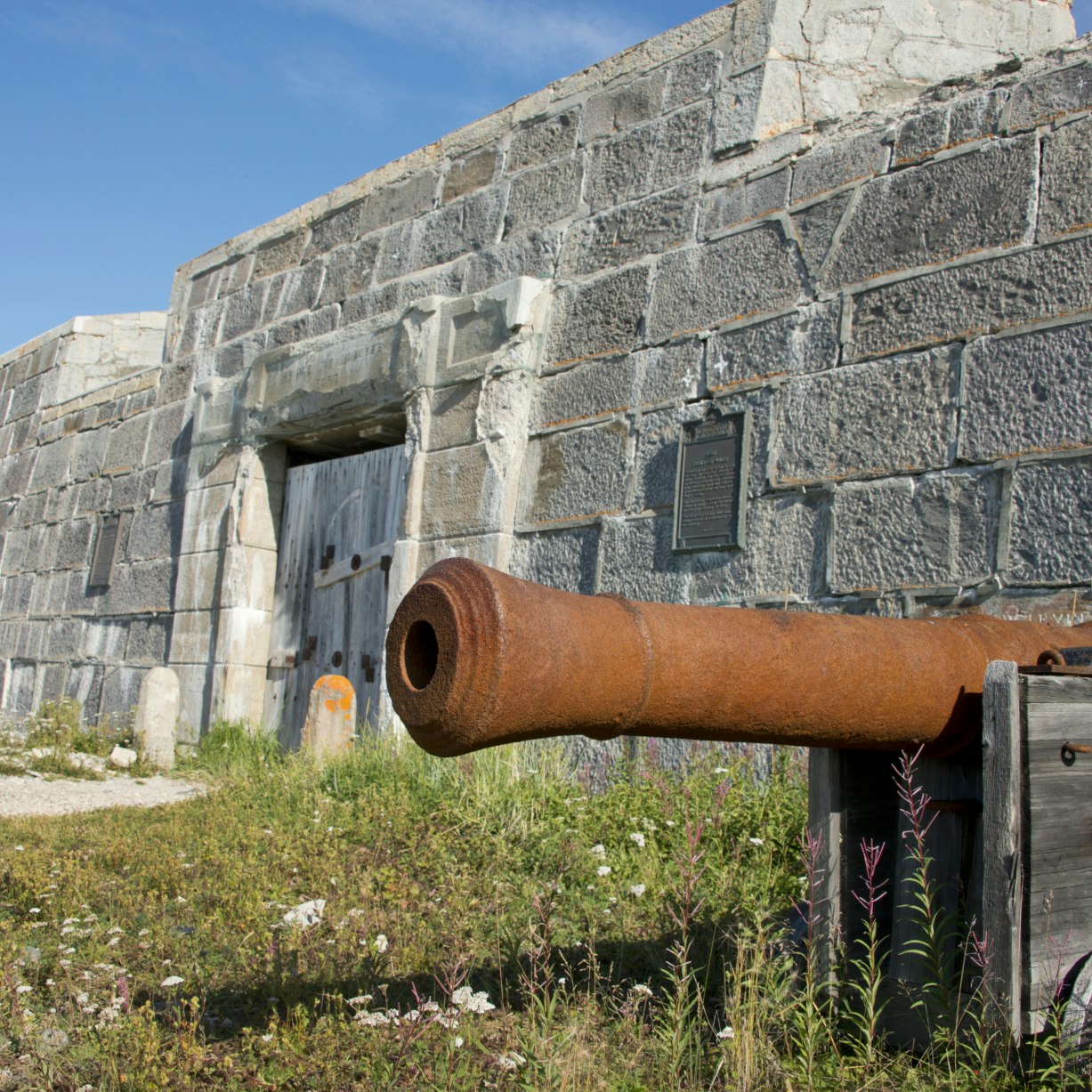 Parks Canada, National Historic Site of Canada, Prince of Wales Fort, Antique cannon in front of fort wall, Churchill, Manitoba, Canada