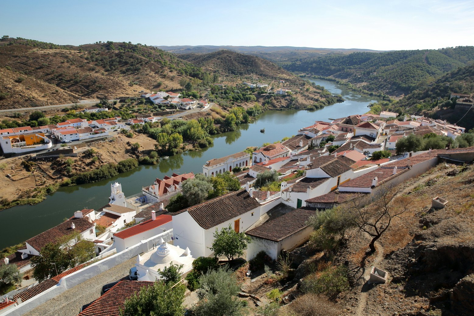 MERTOLA, PORTUGAL: General view of the fortified village and the surrounding hills from the castle; Shutterstock ID 511409617; Your name (First / Last): Tom Stainer; GL account no.: 65050 ; Netsuite department name: Online Editorial ; Full Product or Project name including edition: Best in Europe 2017