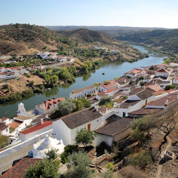 MERTOLA, PORTUGAL: General view of the fortified village and the surrounding hills from the castle; Shutterstock ID 511409617; Your name (First / Last): Tom Stainer; GL account no.: 65050 ; Netsuite department name: Online Editorial ; Full Product or Project name including edition: Best in Europe 2017