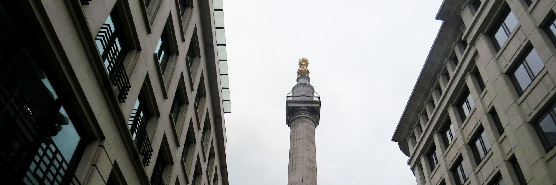 Looking up at Monument, a column marking the spot where the Great Fire of London started