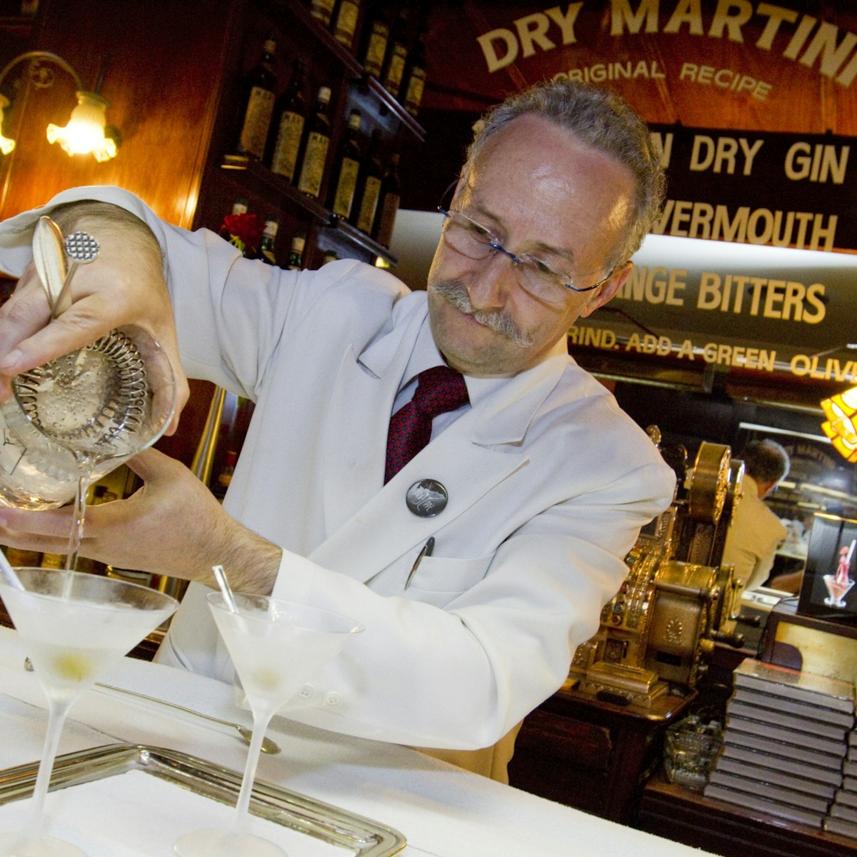 Barman preparing a Dry Martini in Dry Martini Cosmopolitan Bar, L'Eixample.