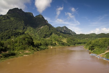 Pirogues moored in Nam Ou river
