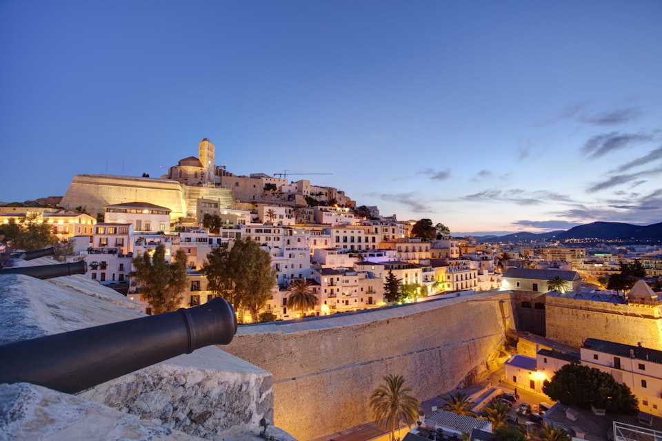 Spain, Balearic Islands, Ibiza, view of Ibiza old town and Dalt Vila at dusk