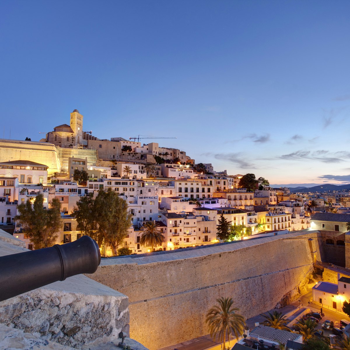 Spain, Balearic Islands, Ibiza, view of Ibiza old town and Dalt Vila at dusk
