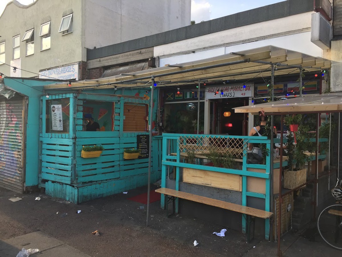 Outside Ridley Road Market Bar, a tropical-themed den in Dalston