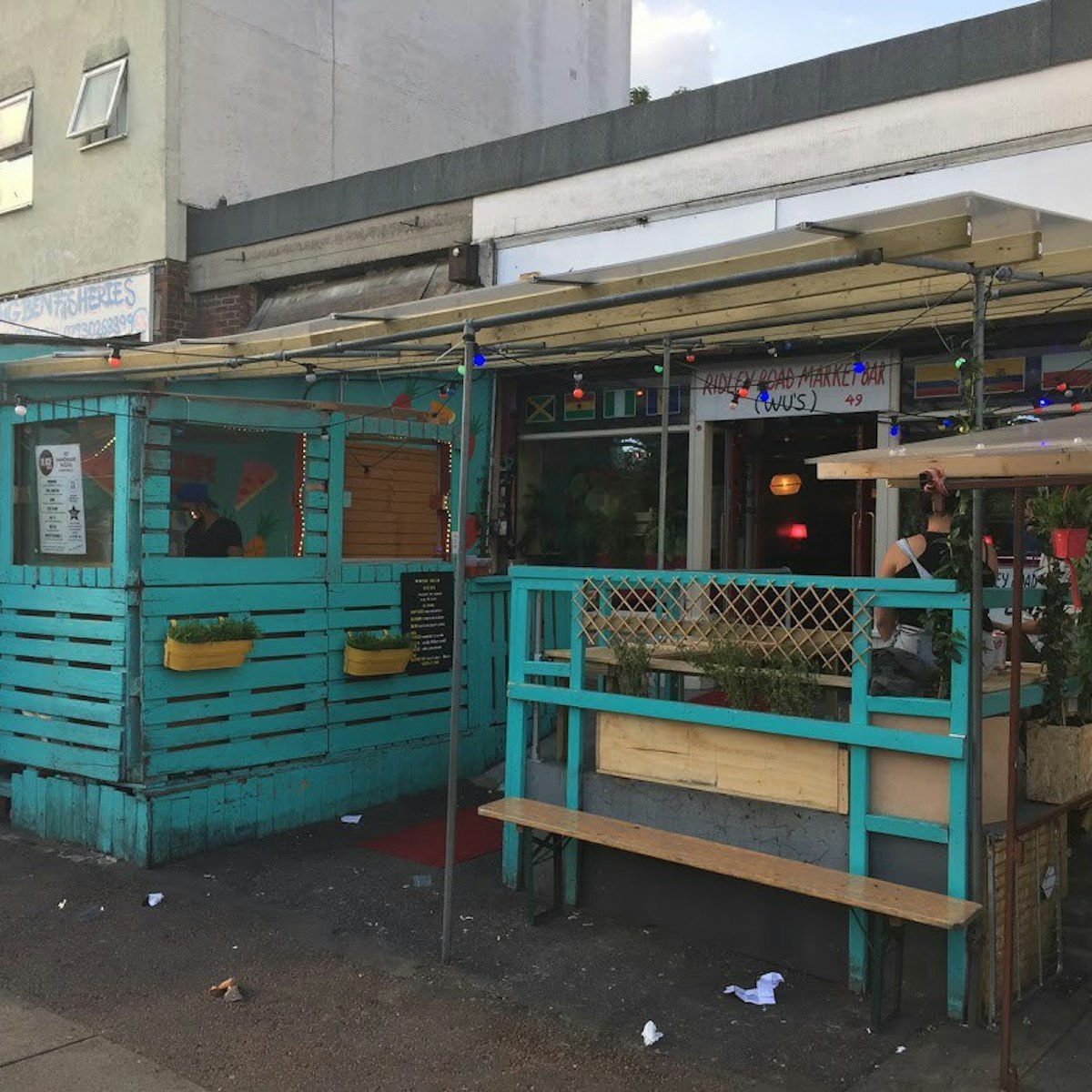 Outside Ridley Road Market Bar, a tropical-themed den in Dalston
