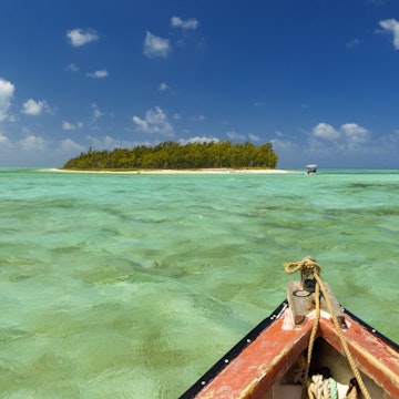 Mauritius, Rodrigues Island, Pointe Mangue, horizontal view of a deserted island in the middle of a lagoon turquoise waters from a boat