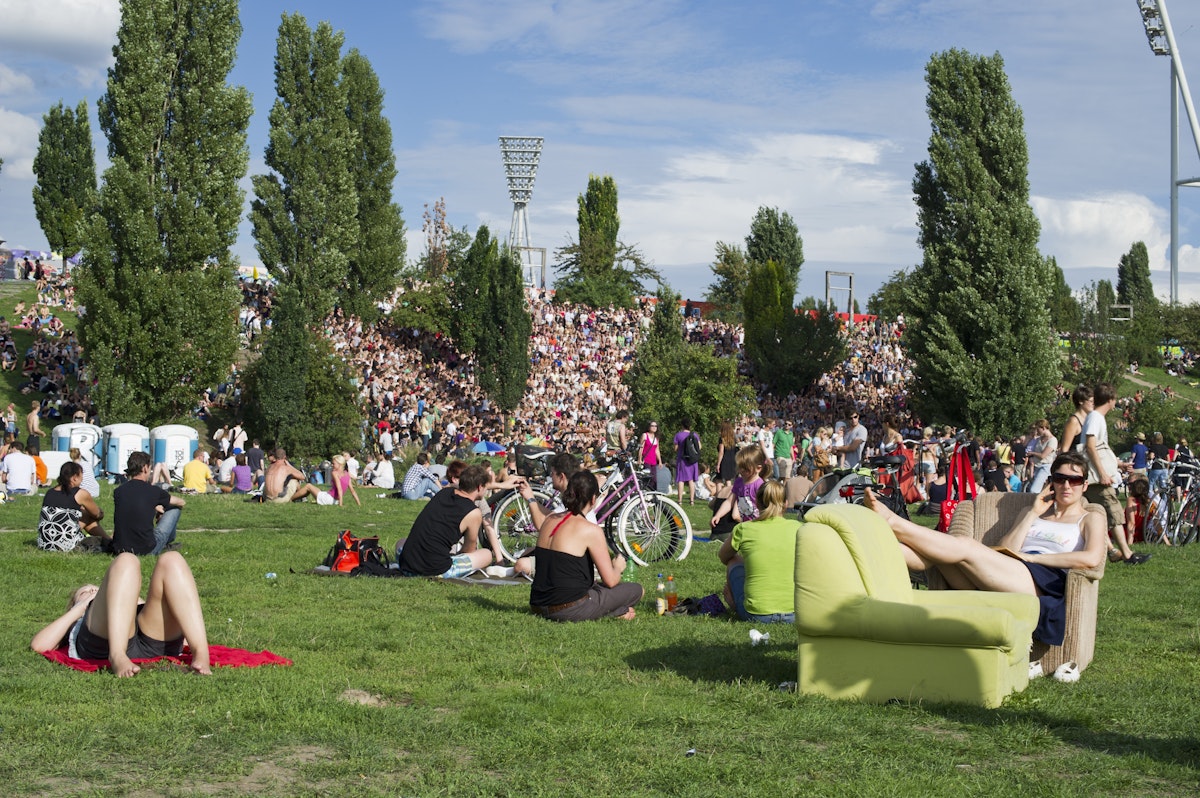 Crowd of people on a Sunday in Mauerpark (Wall Park).