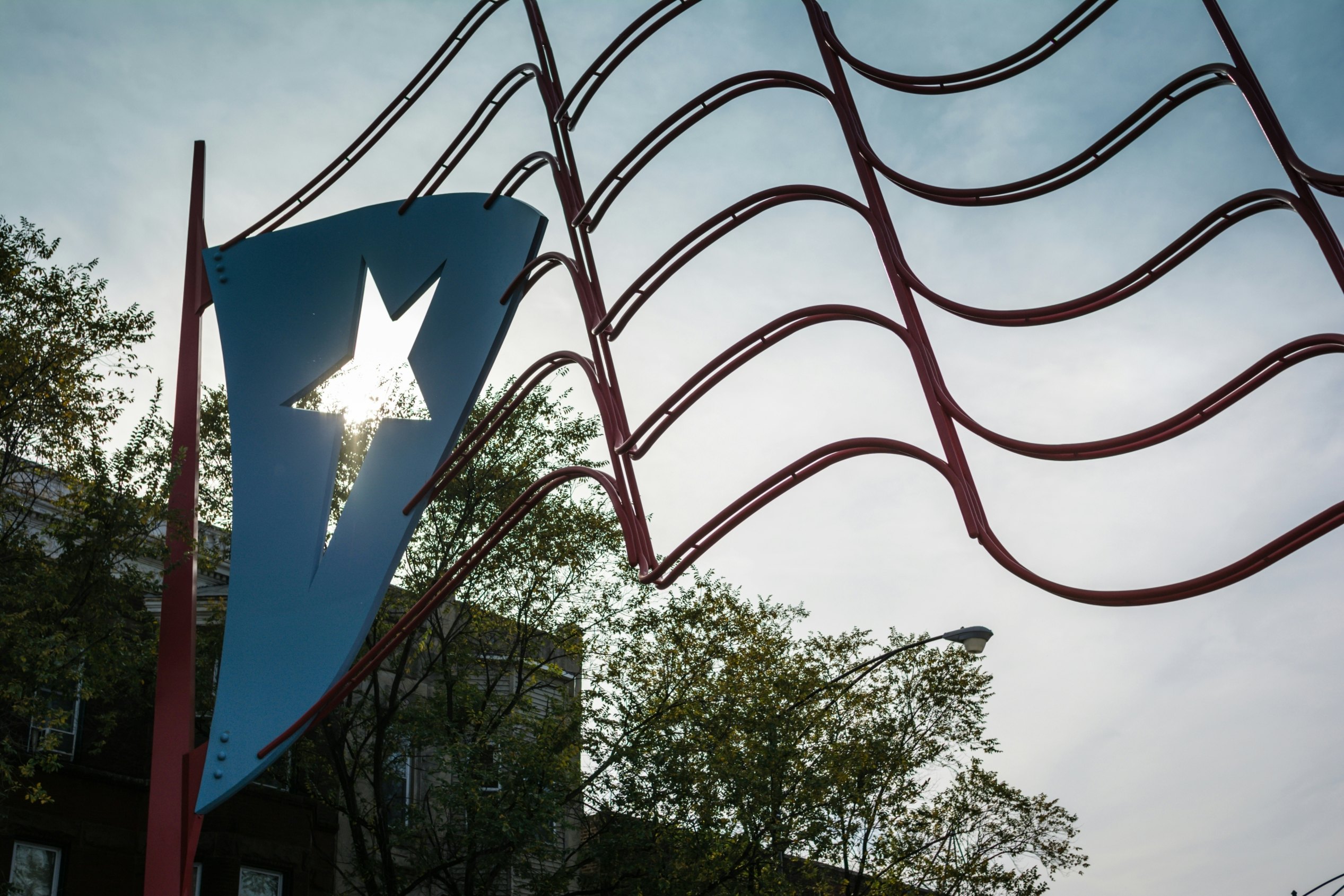 500px Photo ID: 89361423 - The Puertorican flag is the center of attraction at Paseo Boricua on Division Street in Chicago, Il. The section known as Humboldt Park has a large concentration of Puertorican families living in it.