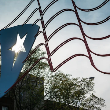 500px Photo ID: 89361423 - The Puertorican flag is the center of attraction at Paseo Boricua on Division Street in Chicago, Il. The section known as Humboldt Park has a large concentration of Puertorican families living in it.