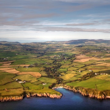 Aerial view of Isle of Man coastline and fields